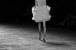 Fashion model walking a runway, representing Gabriella Brooks's modeling career