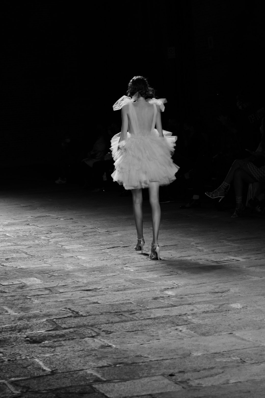 Fashion model walking a runway, representing Gabriella Brooks's modeling career
