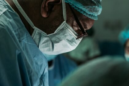 Orthopedic surgeon in medical scrubs representing Dr. Daniel Christopher Allison's career in orthopedic oncology