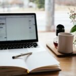 Writer working at a desk representing Blair Warren's career in persuasion and copywriting